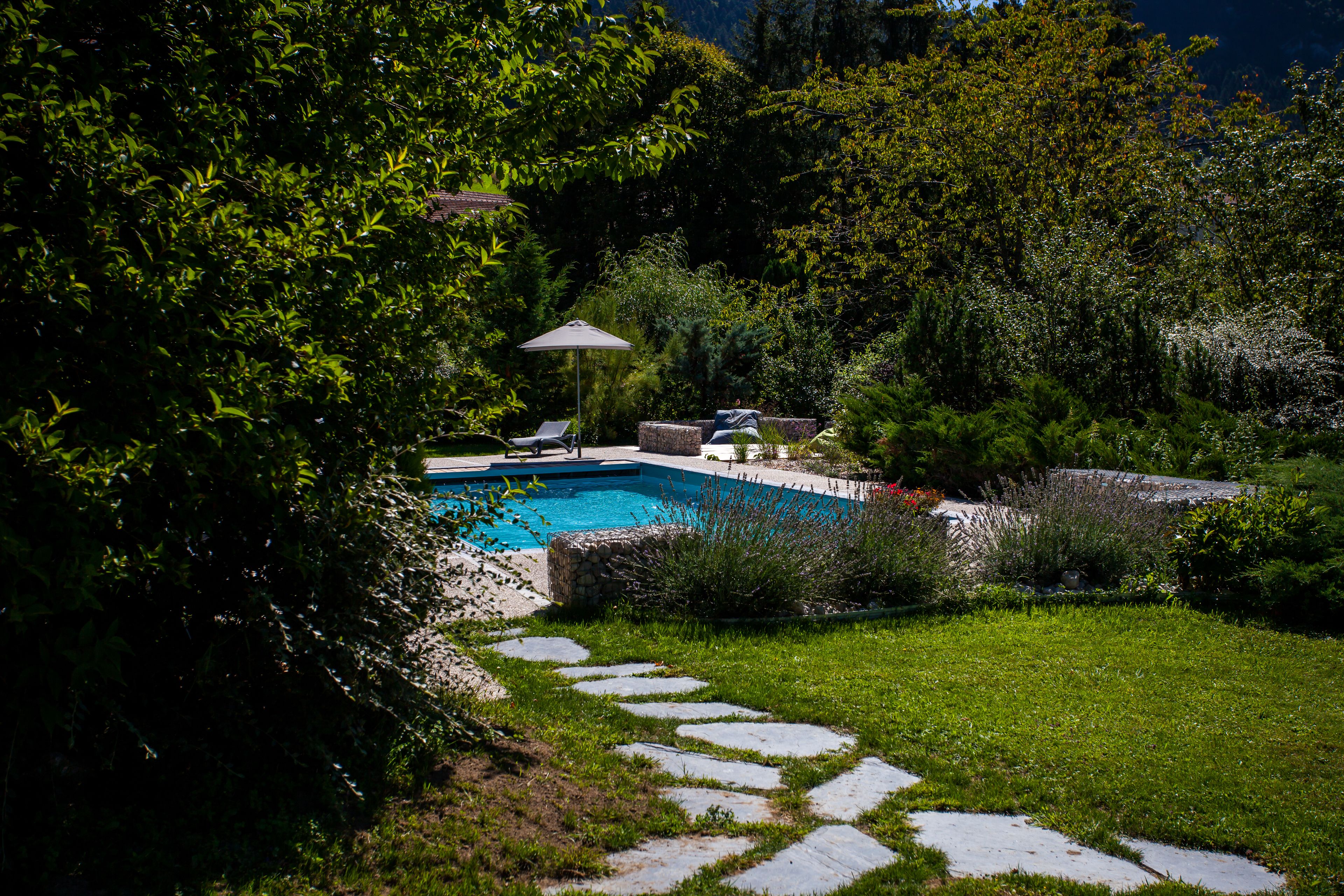 seasonal outdoor pool, open 8:00 am to 11:00 pm, pool umbrellas