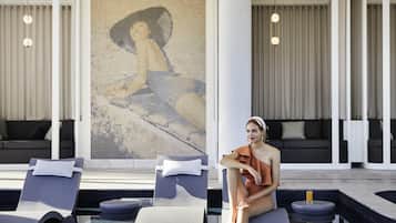 Indoor pool, open 7:00 AM to 10:00 PM, pool loungers