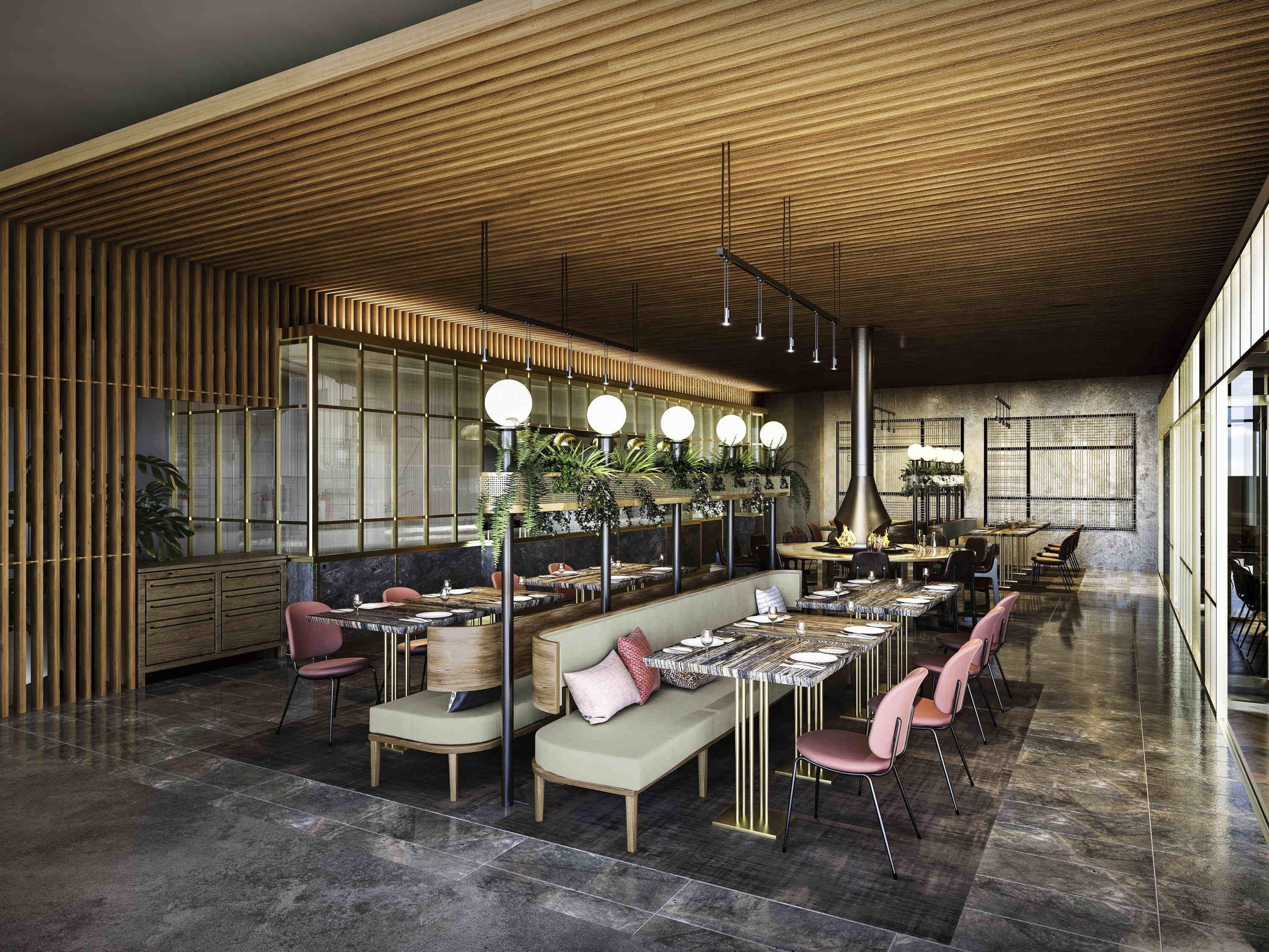 A spacious restaurant with high ceilings, wooden paneling, and modern furnishings.