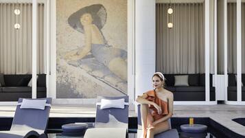 Indoor pool, open 7:00 AM to 10:00 PM, sun loungers