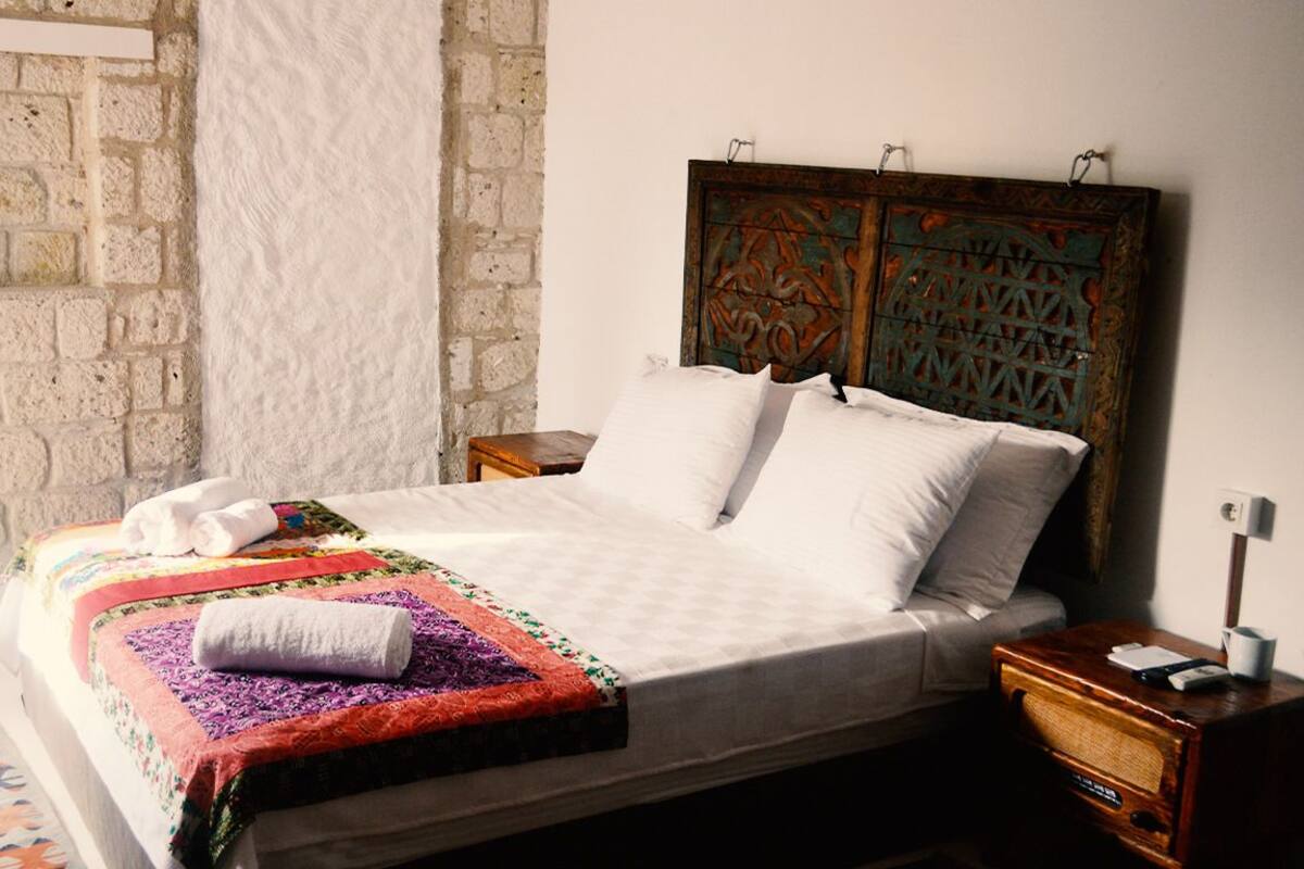 Deluxe Room, 1 Queen Bed, Fireplace, Pool View | 1 bedroom, minibar, in-room safe, iron/ironing board
