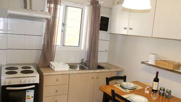 Apartment, 1 Schlafzimmer | Eigene Küche | Großer Kühlschrank, Mikrowelle, Ofen, Herdplatte
