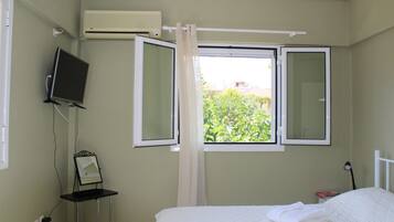 Apartment, 1 Bedroom | 1 bedroom, iron/ironing board, free WiFi, bed sheets