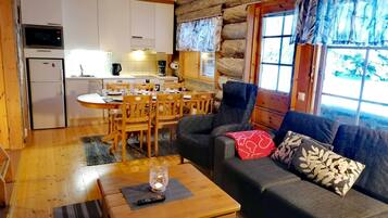 Apartment, 2 Bedrooms, Sauna | Living room | 42-inch Smart TV with digital channels, fireplace, heated floors