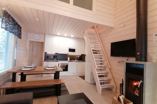 Apartment, 2 Bedrooms, Sauna | Living room | 40-inch flat-screen TV with digital channels, TV, fireplace