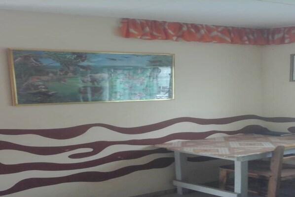 Desk, blackout curtains, free WiFi, bed sheets