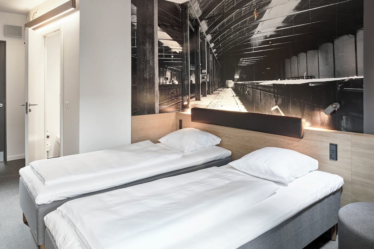 standard twin room | hypo-allergenic bedding, laptop workspace, blackout curtains