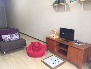Apartment, 3 Bedrooms | Living room | LED TV, table tennis