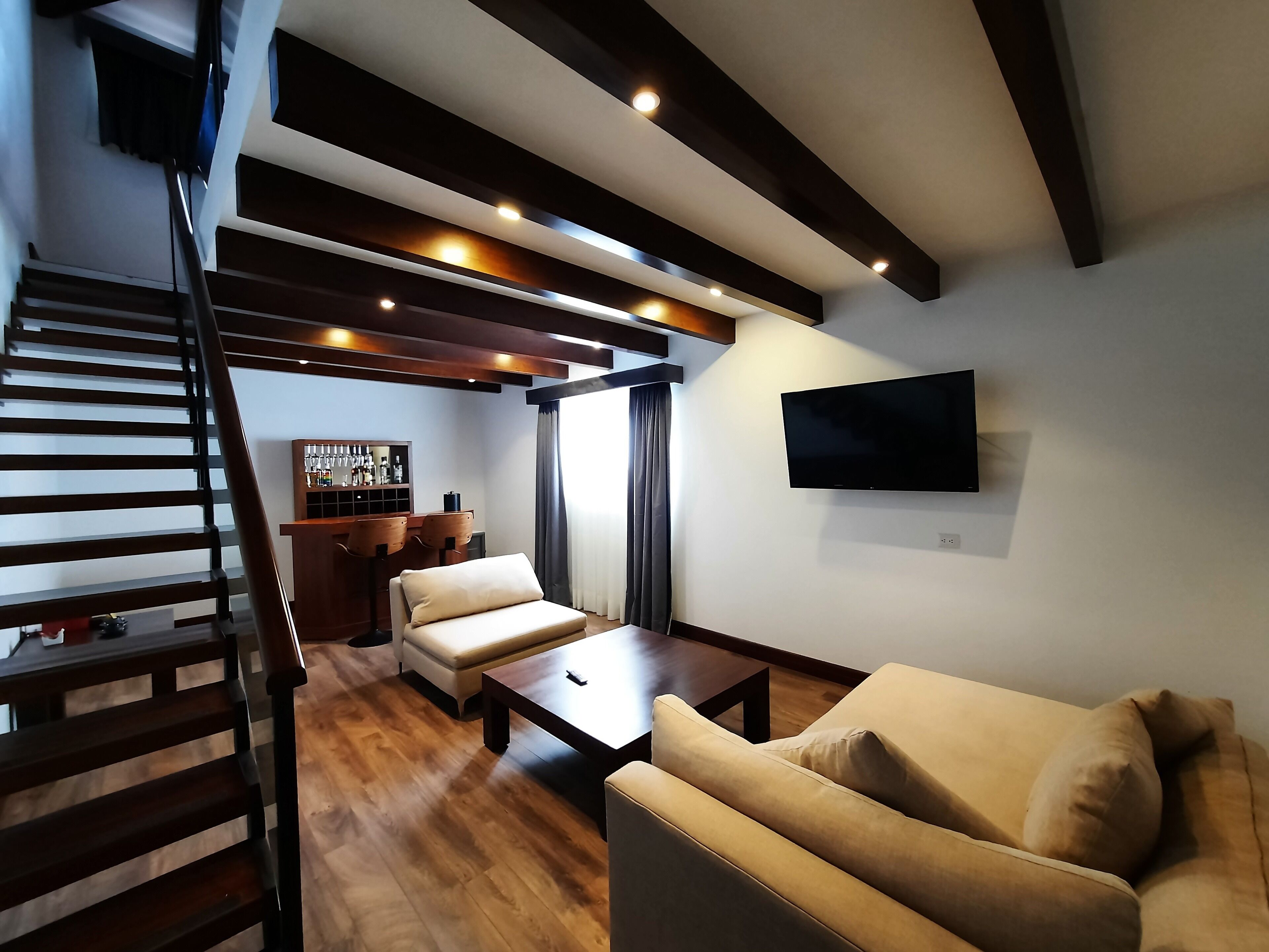 deluxe suite | premium bedding, down duvets, in-room safe, desk