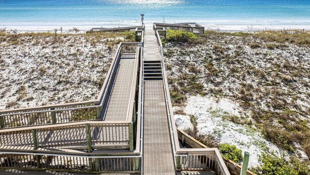 A wooden boardwalk leading to a beach with a clear view of the ocean. - Inlet Reef 205 2 Bedroom Apts by RedAwning (Destin)