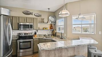 Condo, 2 Bedrooms | Private kitchen | Fridge, microwave, oven, dishwasher
