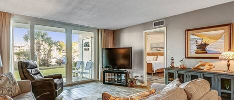 Condo, 2 Bedrooms | Living room | 30-inch flat-screen TV with cable channels, TV, DVD player