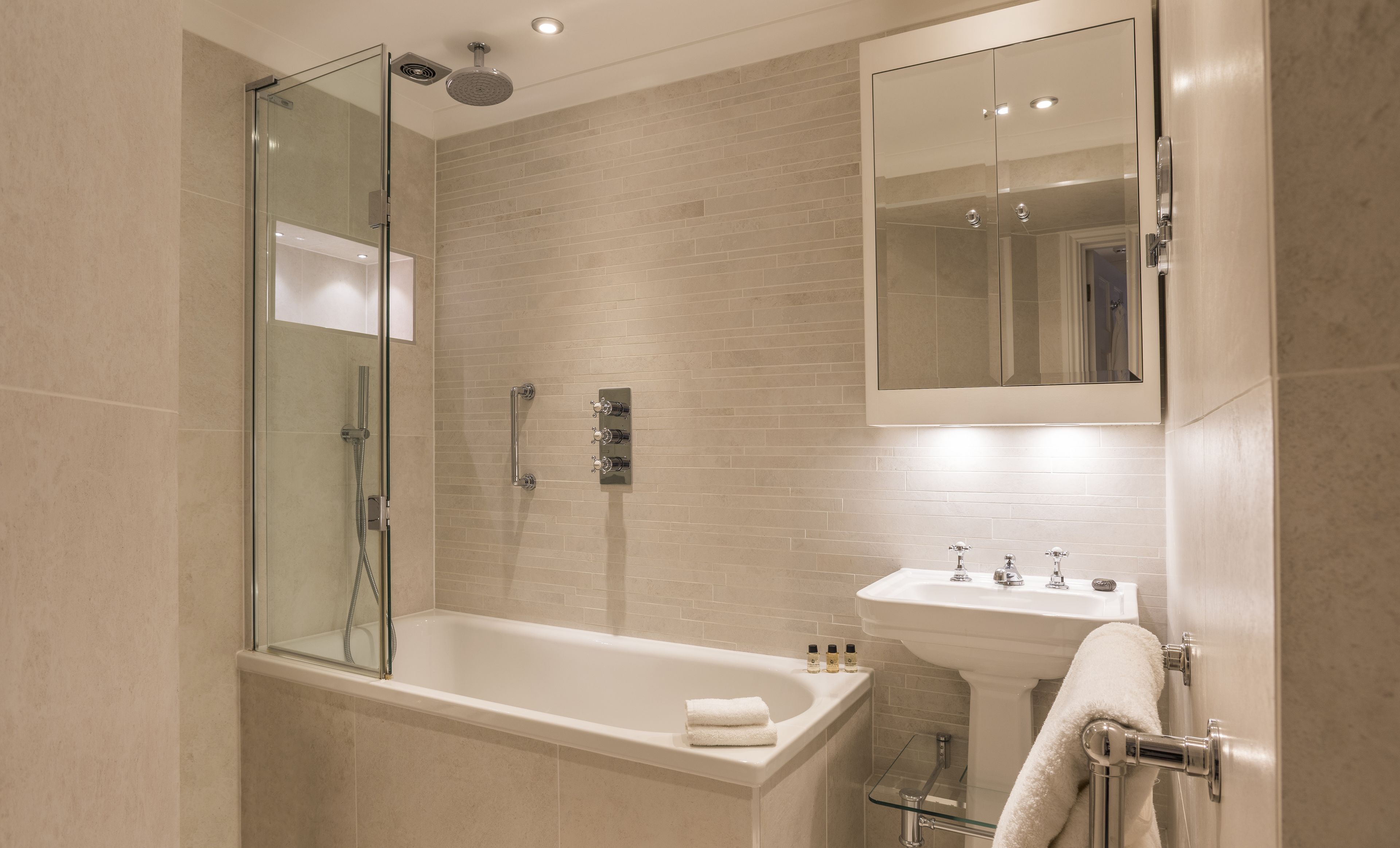 shower, free toiletries, hair dryer, towels