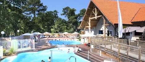 Seasonal outdoor pool, pool umbrellas, sun loungers