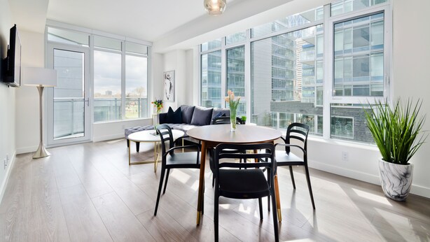 Executive Condo, 2 Bedrooms, Hot Tub, City View | In-room dining - Suite Digs Waterfront Court (Calgary)