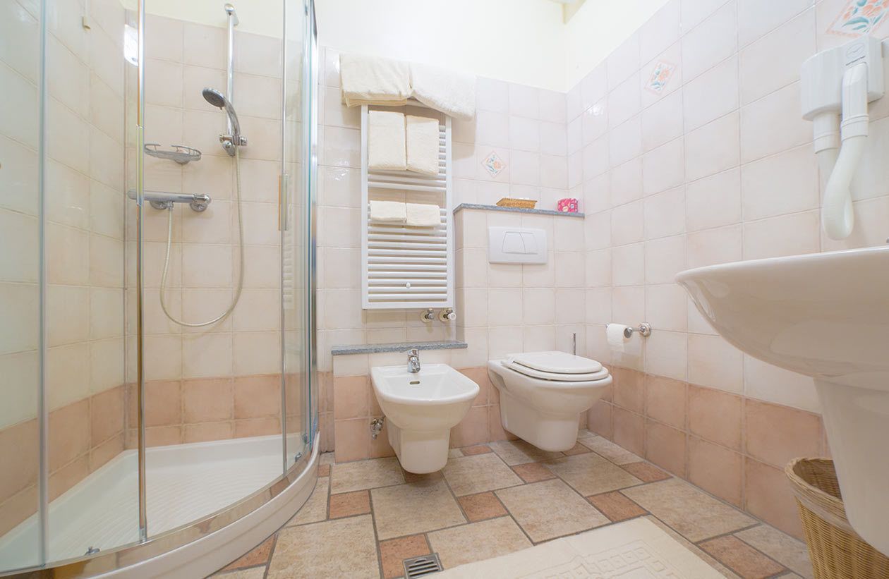 shower, rainfall showerhead, hair dryer, slippers