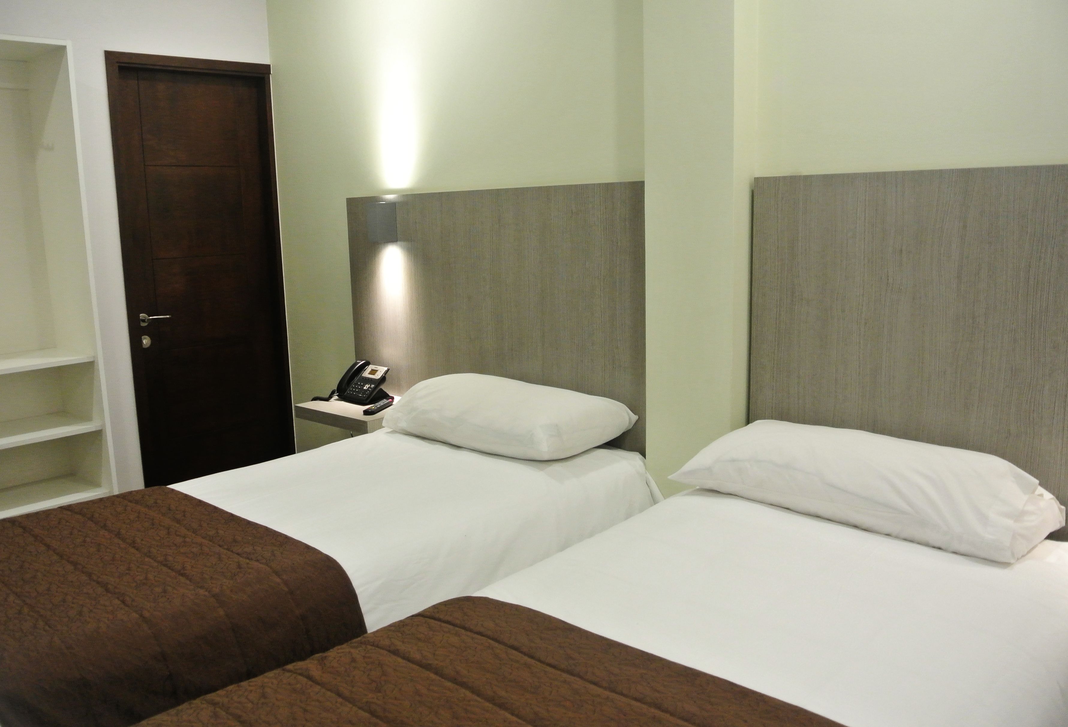 double room, 2 single beds | in-room safe, blackout curtains, soundproofing, iron/ironing board