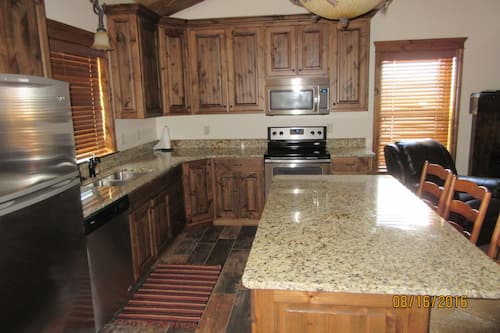 King Deluxe Room | Private kitchen | Fridge, microwave, coffee/tea maker, toaster