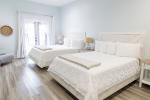 Quarto casal luxo, 2 camas Queen, para não fumantes, vista parcial para o oceano | Vista do quarto