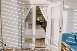 Quarto casal luxo, 2 camas Queen, para não fumantes, vista parcial para o oceano | Vista do quarto