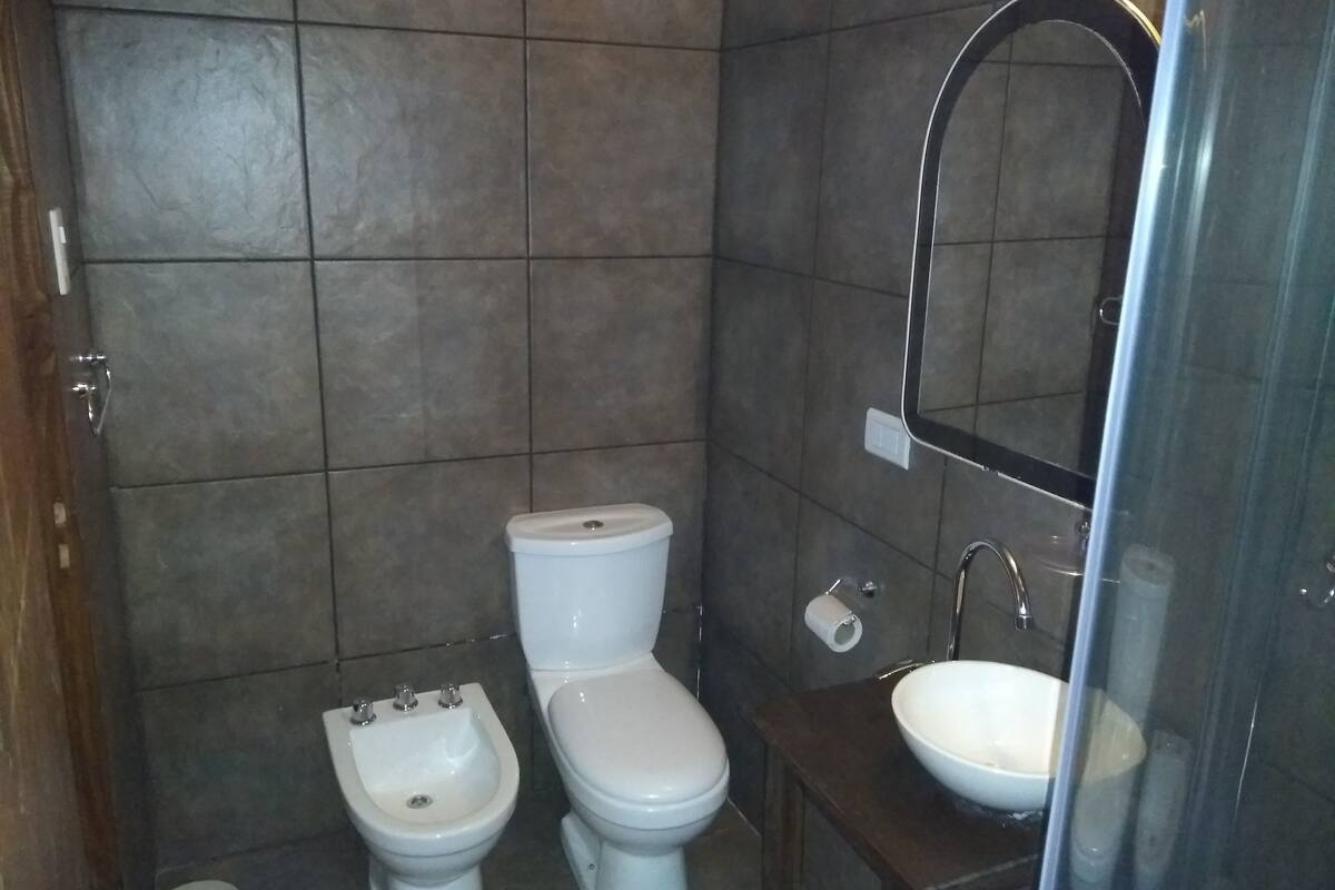 suite, multiple beds, non smoking | bathroom | combined shower/bathtub, towels