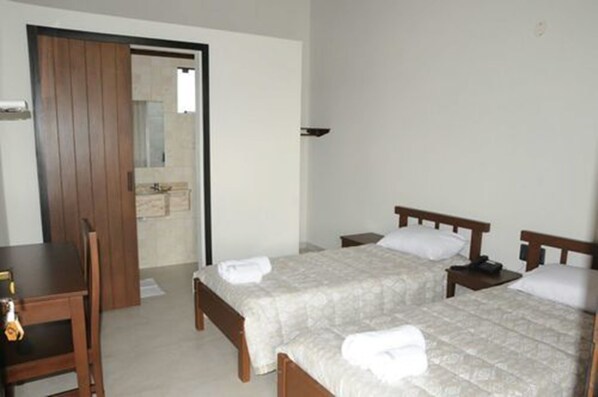 Classic Quadruple Room, Non Smoking, Courtyard View | 2 bedrooms, individually furnished, desk, blackout drapes