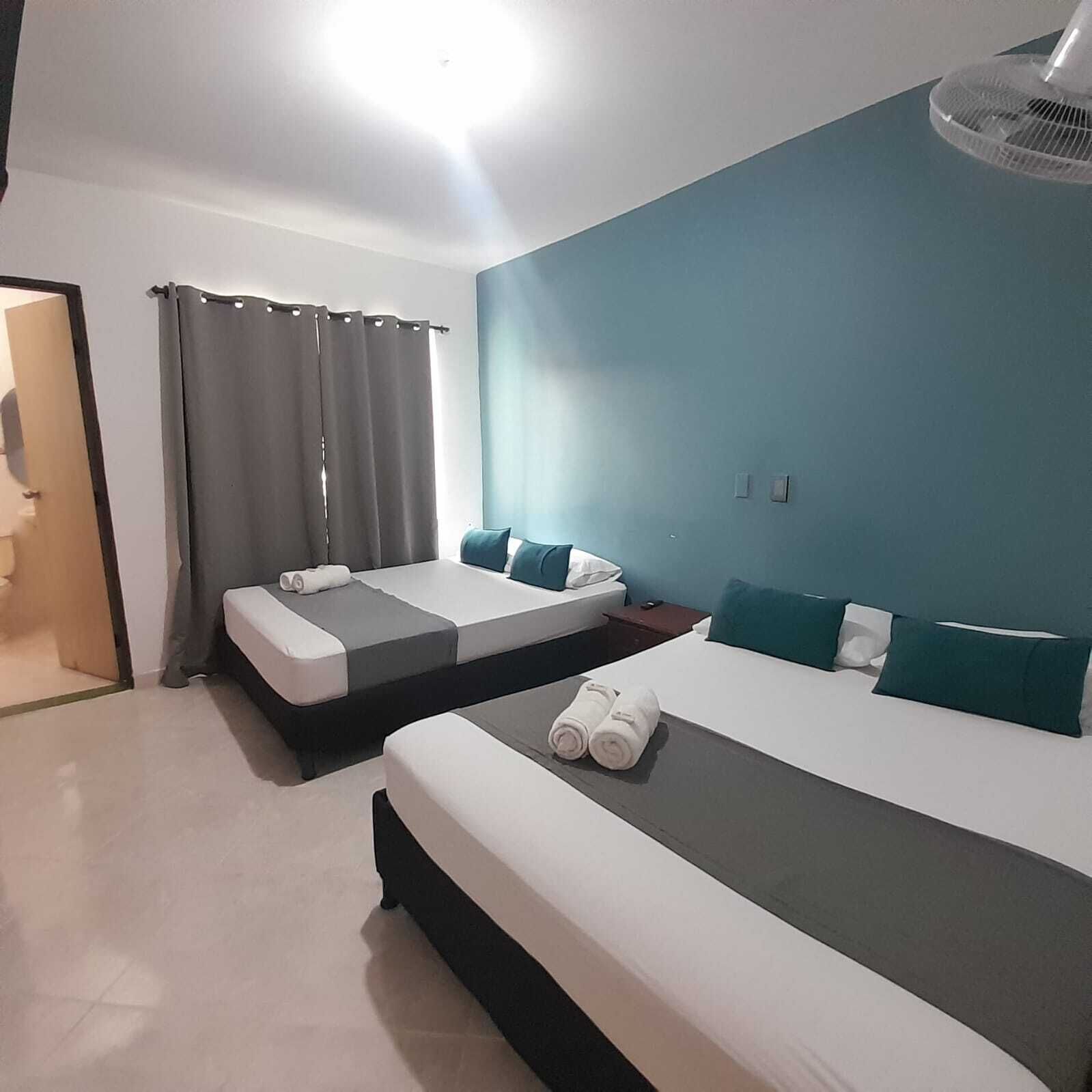 Chambre Quadruple | Bureau, Wi-Fi gratuit, draps fournis