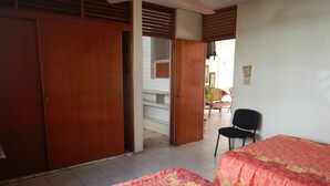 Family Suite, Multiple Beds, Smoking, Partial Ocean View | WiFi (free), bed sheets - Hotel Suites Licha Acapulco (Acapulco)