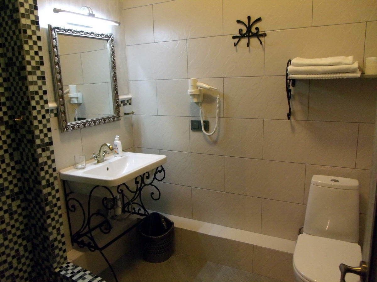 standard double or twin room | bathroom | shower, rainfall showerhead, bathrobes, slippers