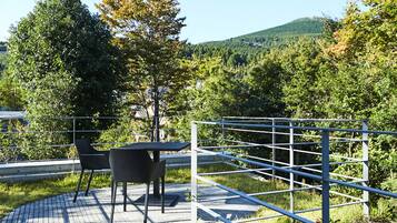 Stylish Maisonette Suite (Available from 8 years old) | Terrace/patio