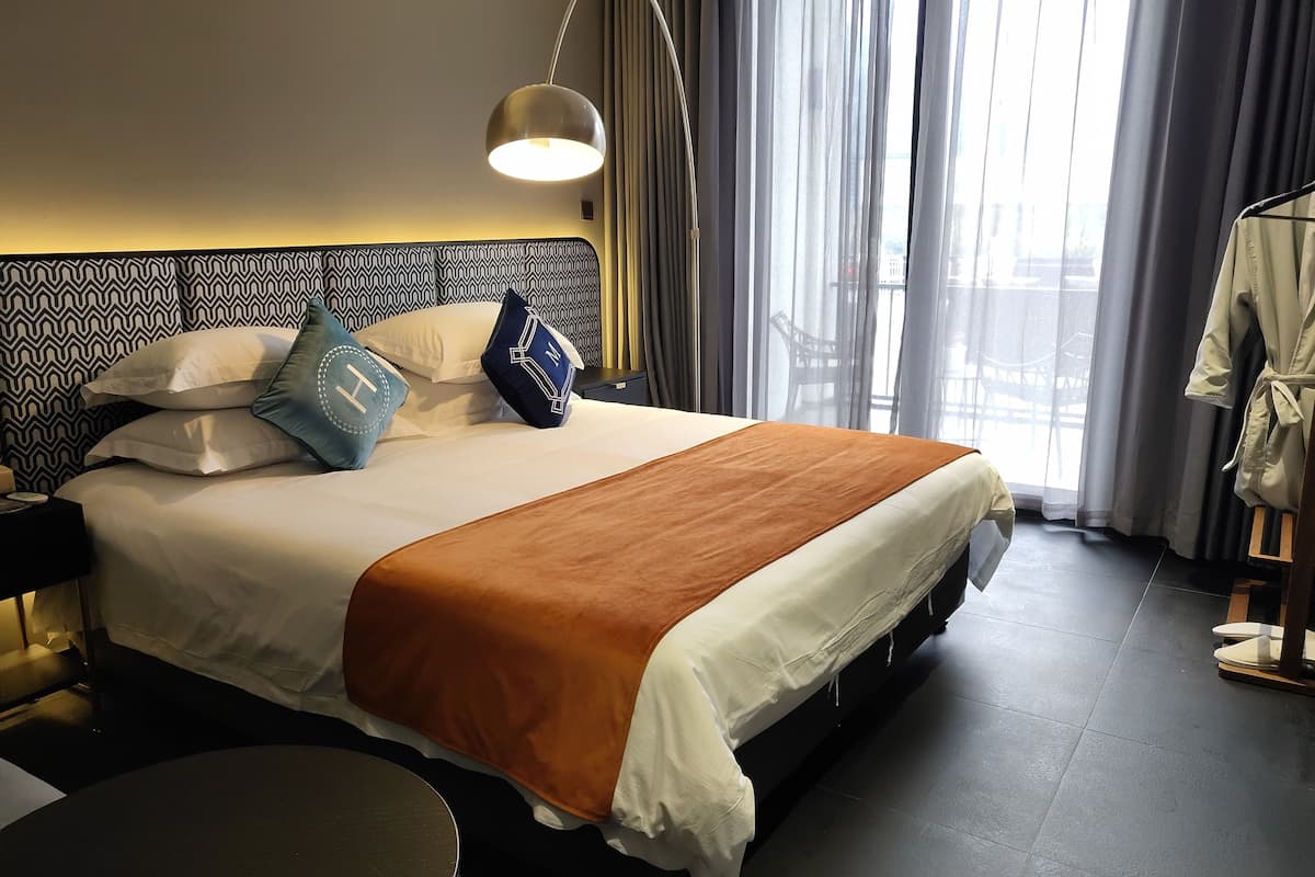 Exclusive Double Room, Courtyard View | 1 bedroom, desk, blackout curtains, free WiFi