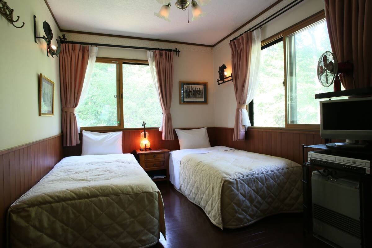 ห้องทวิน | ผ้านวมขนเป็ด, Wi-Fi ฟรี, ห้องพักตกแต่งอย่างมีเอกลักษณ์, ผ้าปูที่นอน