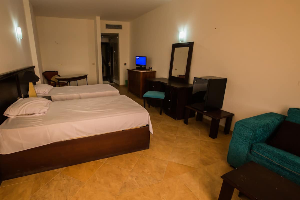 Standard Double or Twin Room | Iron/ironing board, free cots/infant beds, rollaway beds, bed sheets