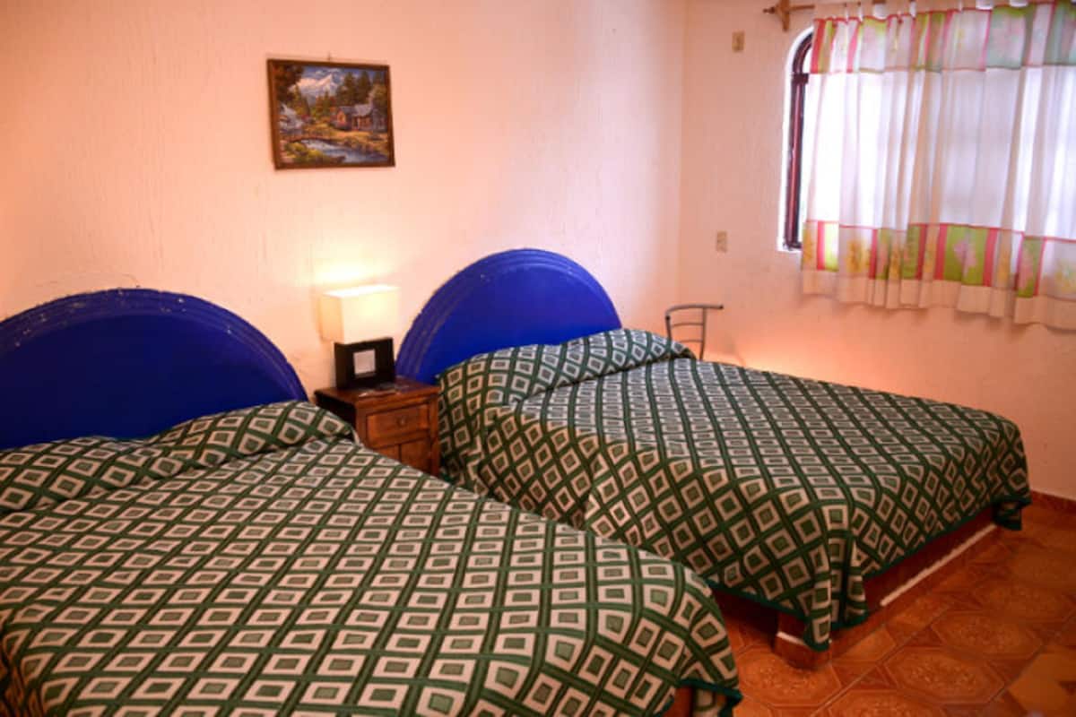 Habitación cuádruple, 2 camas matrimoniales, para no fumadores | Wifi gratis y ropa de cama