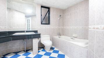 Shower, free toiletries, hair dryer, slippers