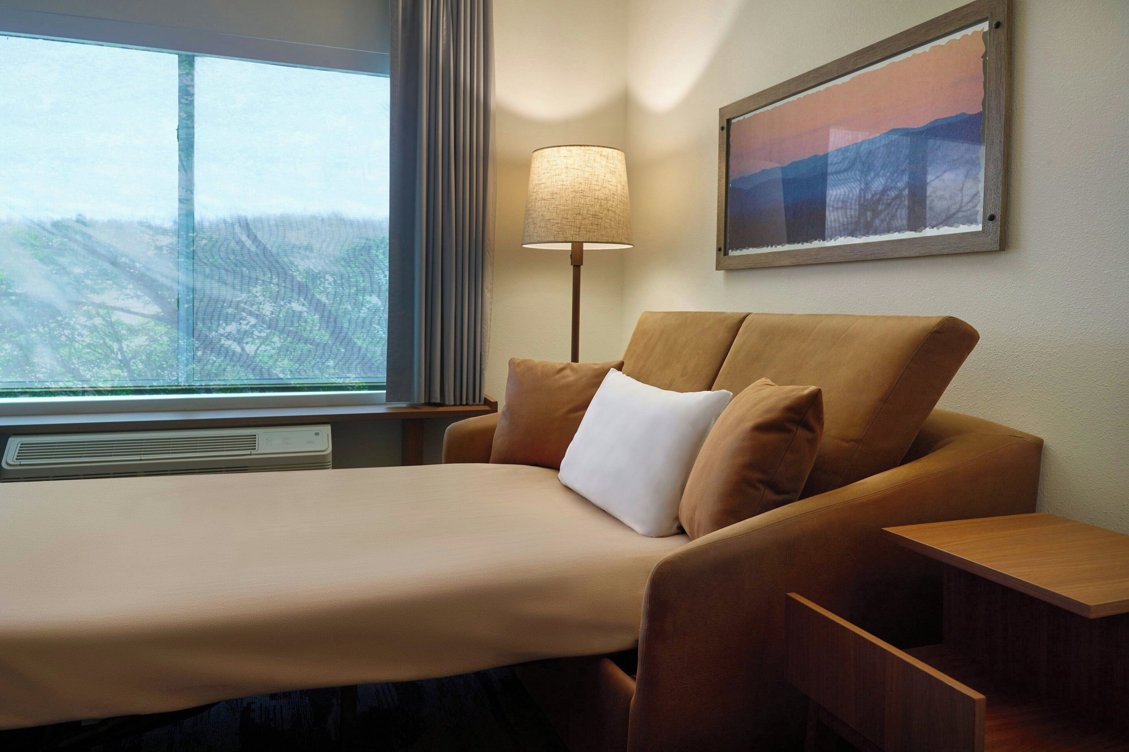 desk, laptop workspace, blackout curtains, iron/ironing board