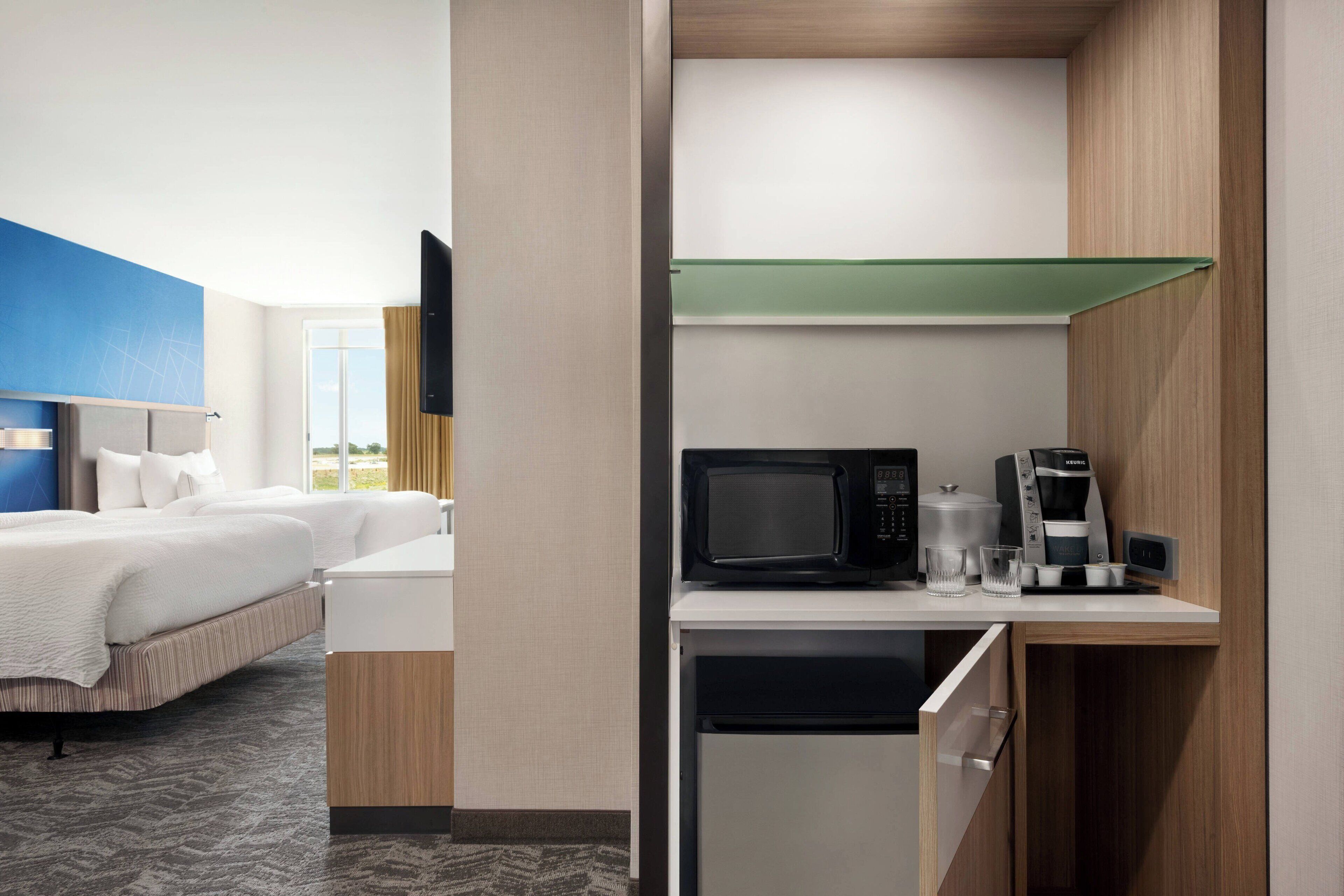 suite, multiple beds, city view | desk, iron/ironing board, free cots/infant beds, free wifi