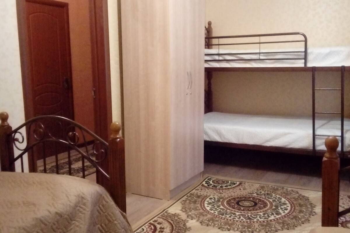 Standard Quadruple Room | Blackout drapes, iron/ironing board, WiFi (free), bed sheets