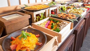 A buffet with various food items including vegetables, meats, and seafood. - Mitsui Garden Hotel Kyoto Station (Kyoto)