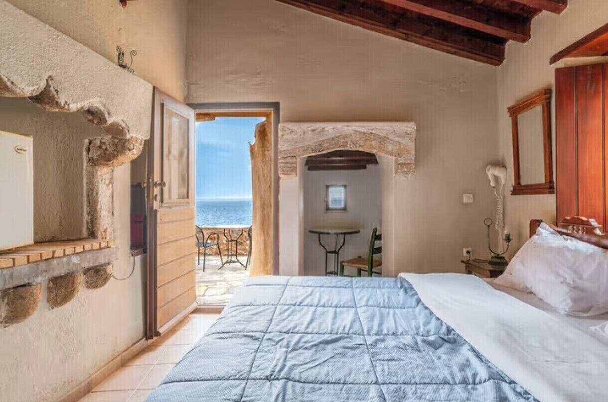 Habitación doble, vistas a la bahía | Ropa de cama