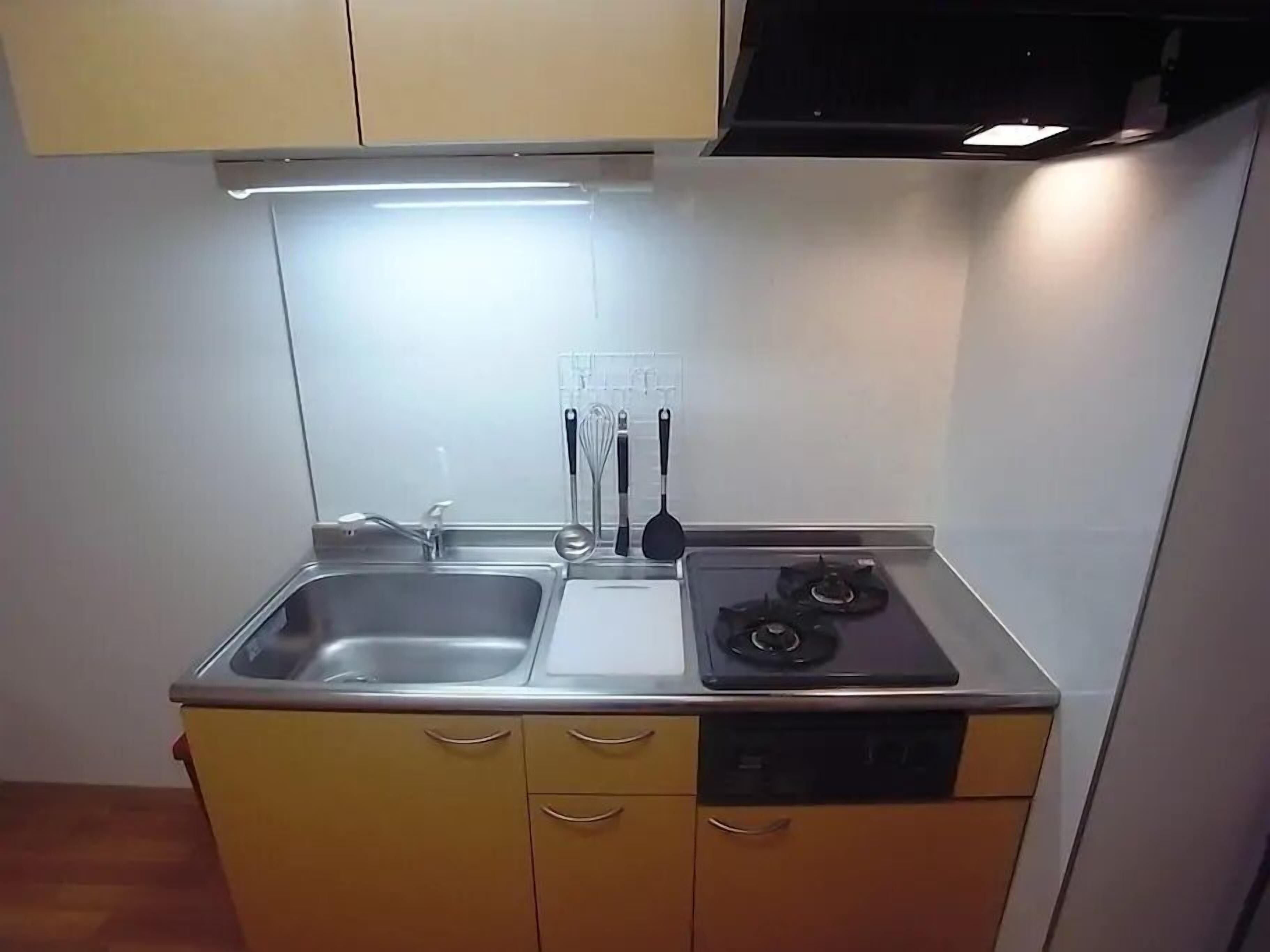 Apartment Double Suite, Non Smoking, 205 | Private kitchenette | Fridge, microwave, stovetop, electric kettle