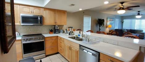 Condo, 2 Bedrooms | Private kitchen | Fridge, oven, coffee/tea maker, toaster