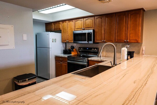 Condo, 2 Bedrooms | Private kitchen | Fridge, oven, coffee/tea maker, toaster