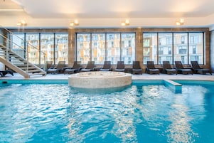 Indoor pool, outdoor pool, open 9:00 AM to 9:00 PM, pool loungers