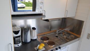Cabaña económica, baño compartido | Cocina privada | Microondas