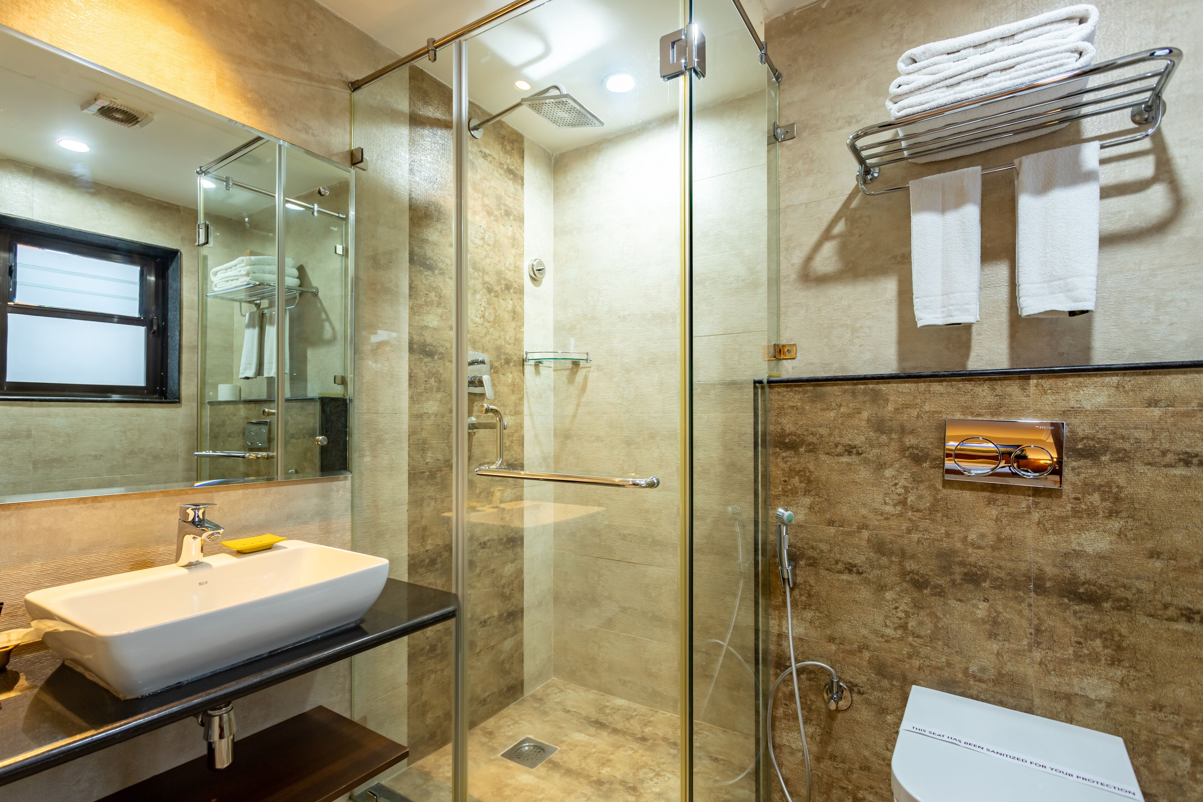 executive suite | bathroom | free toiletries, hair dryer, slippers, towels