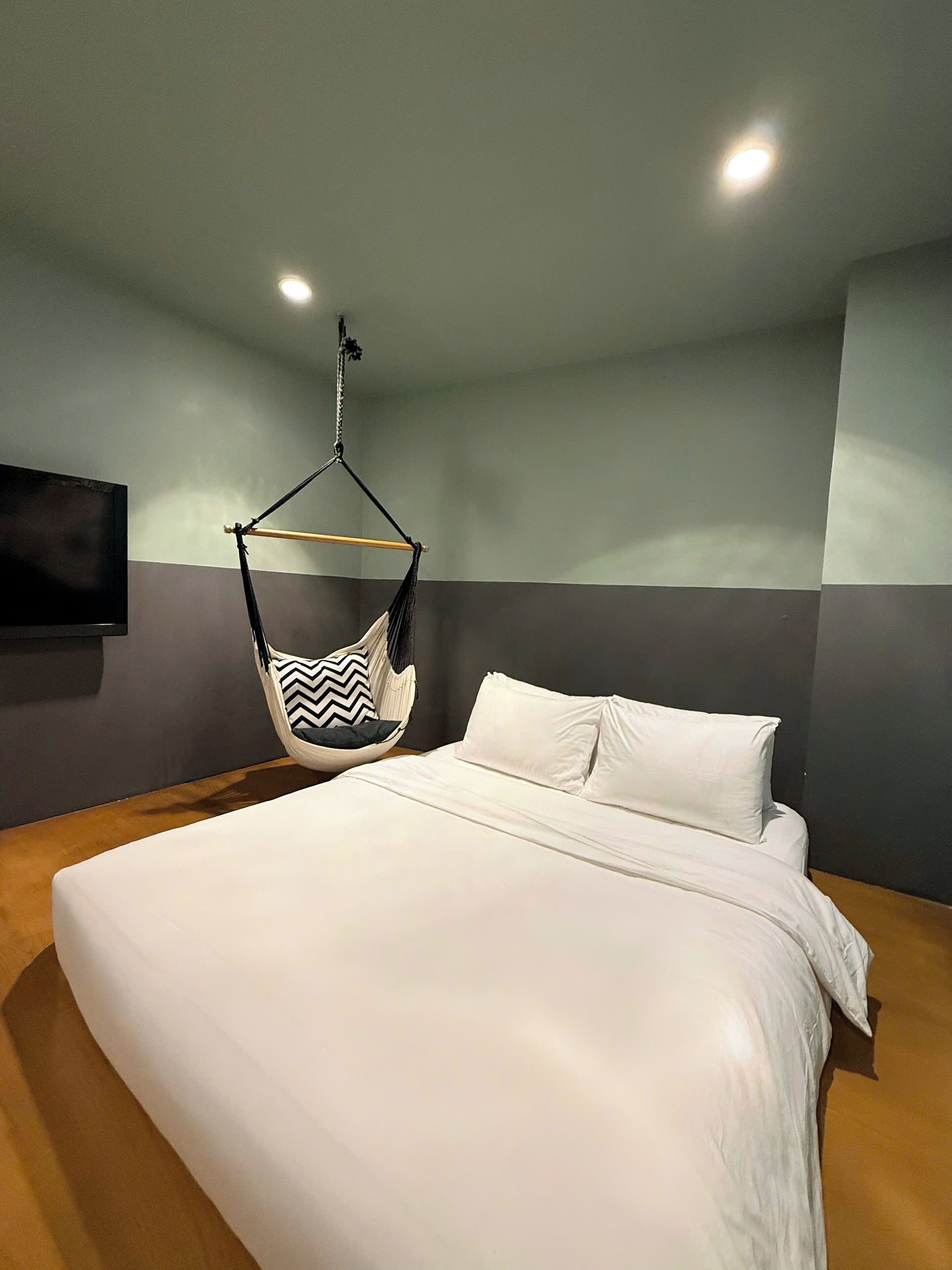 Cozy Double Nest No Window | Premium bedding, down comforters, minibar, in-room safe