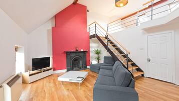 Apartment, 2 Bedrooms | Living area | Flat-screen TV