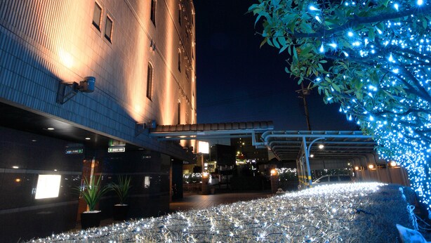 A building with a brick facade and multiple windows. - Hotel Cherena - Adult Only (Kunitachi)