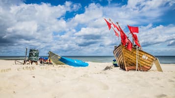 On the beach, white sand